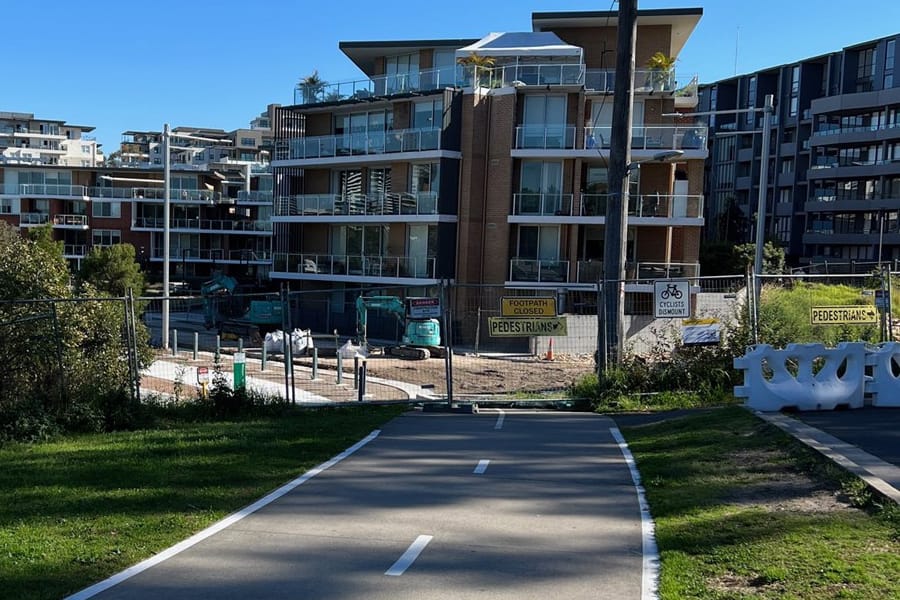 Paved pedestrian and bike path in urban residential area